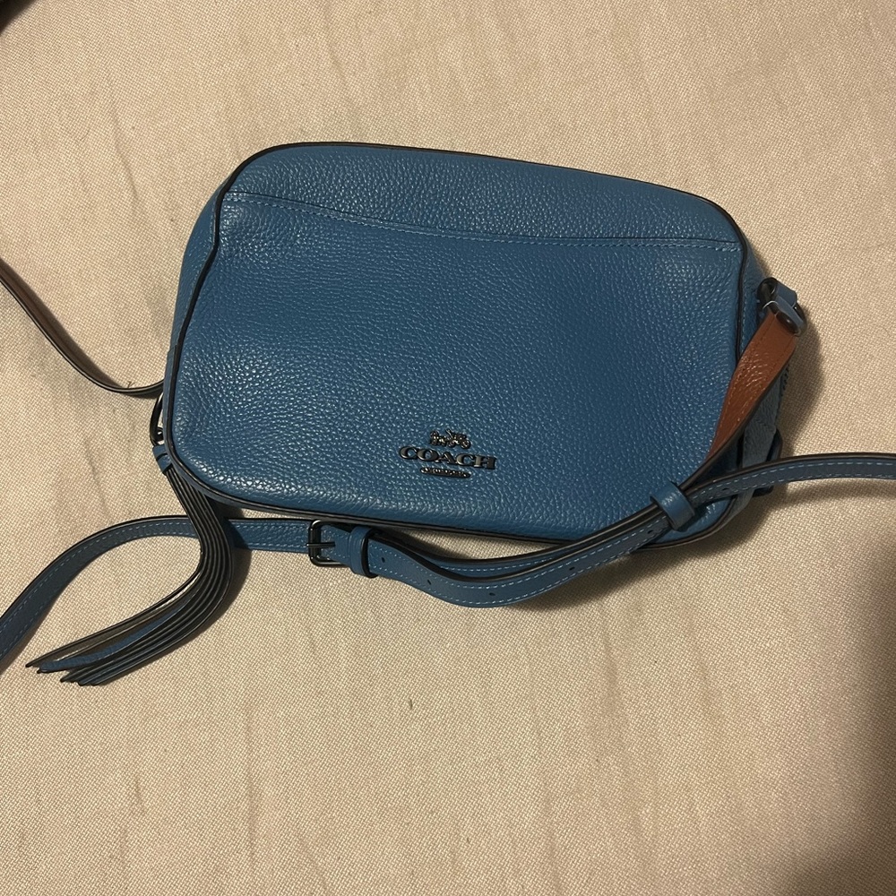 Coach crossbody bag in color blue. Never worn and excellent condition